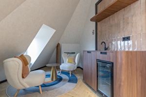 sitting area with minibar in hotel in scheveningen